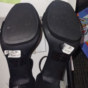 Multiple pairs of women's shoes